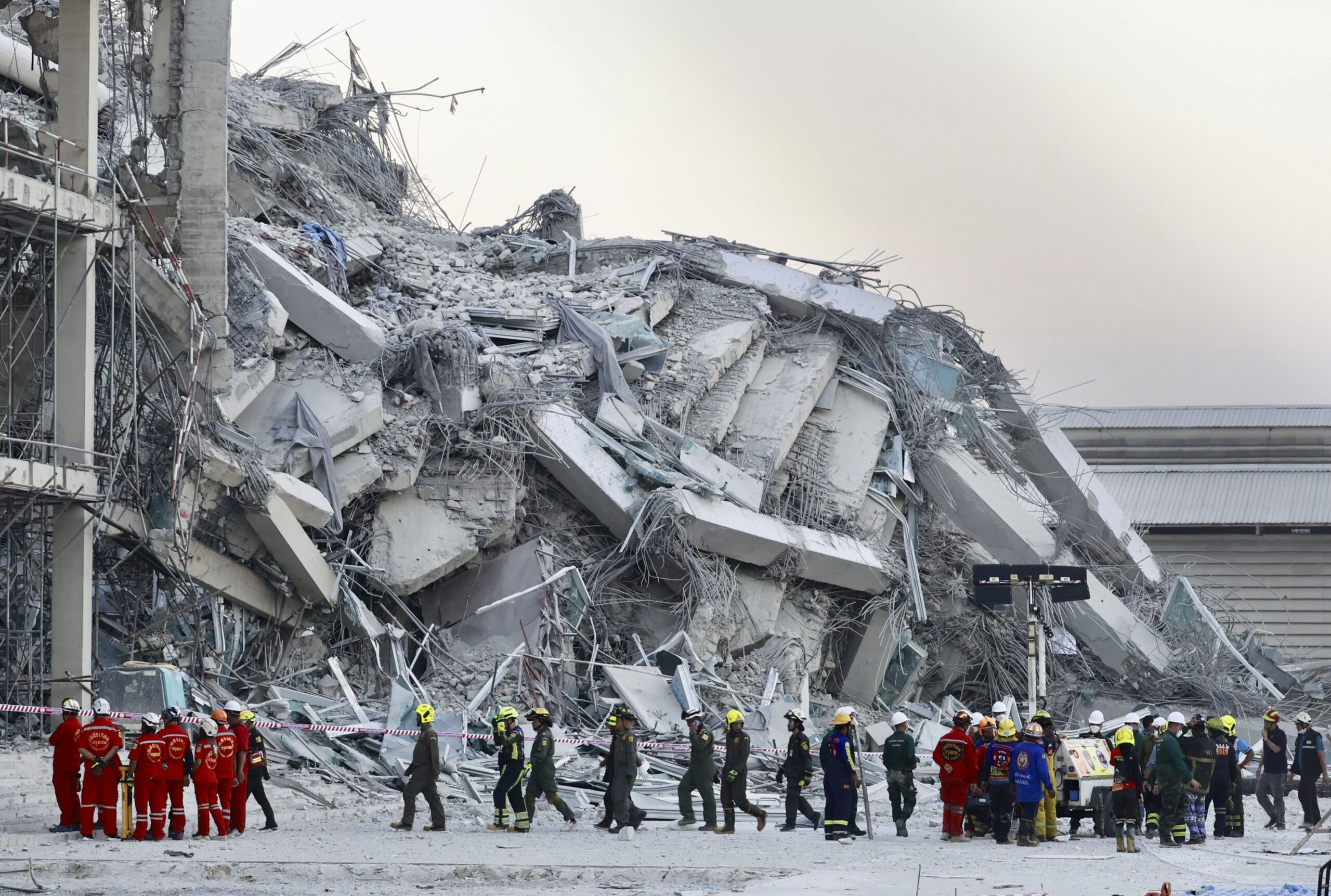 Thai-Chinese Firm Denies Flouting Safety Measures in Probe of Skyscraper Collapse