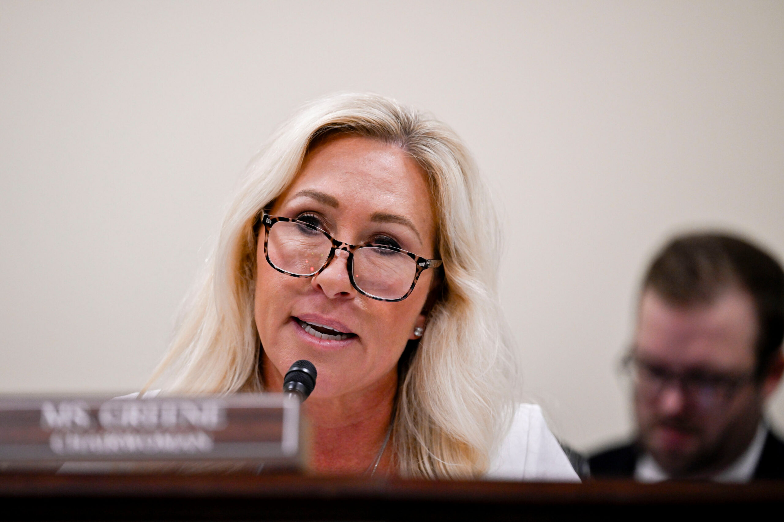 Tax Bill’s Bid to Ban New AI Rules Faces Bipartisan Blowback